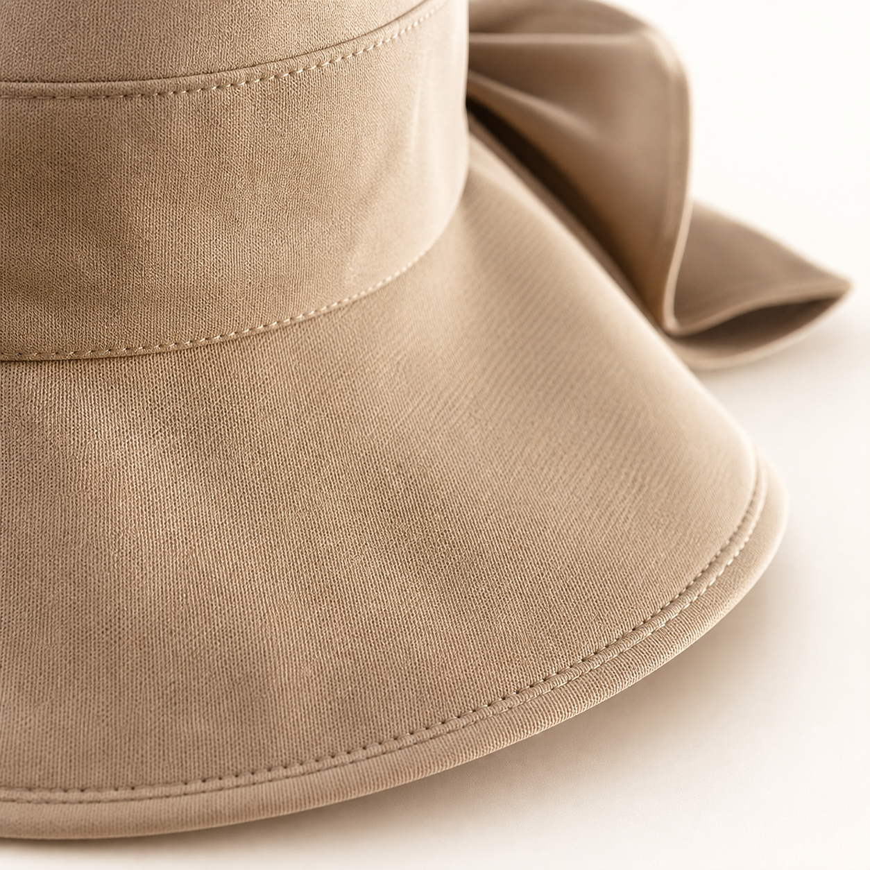 Close-up breathable beige sun hat fabric and stitching