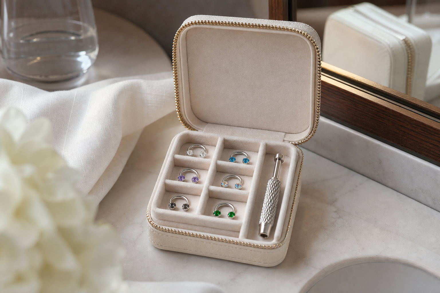 Travel case organization for crystal nose rings and helper tool